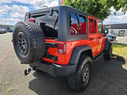 Sunset Orange Pearl 2015 Jeep Wrangler Unlimited Rubicon