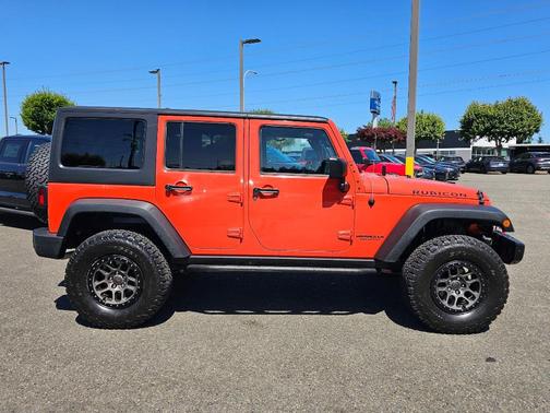 Sunset Orange Pearl 2015 Jeep Wrangler Unlimited Rubicon