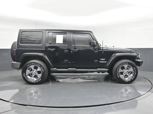 Black 2016 Jeep Wrangler Unlimited Sahara
