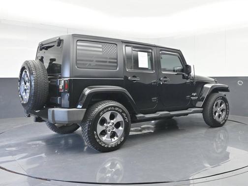 Black 2016 Jeep Wrangler Unlimited Sahara