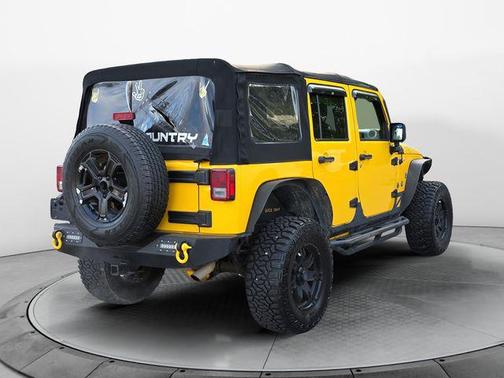 Baja Yellow Clearcoat 2015 Jeep Wrangler Unlimited Sahara
