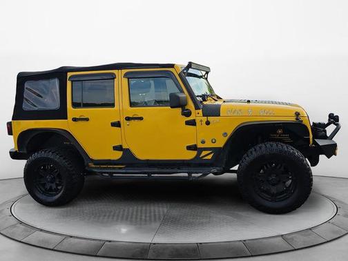 Baja Yellow Clearcoat 2015 Jeep Wrangler Unlimited Sahara