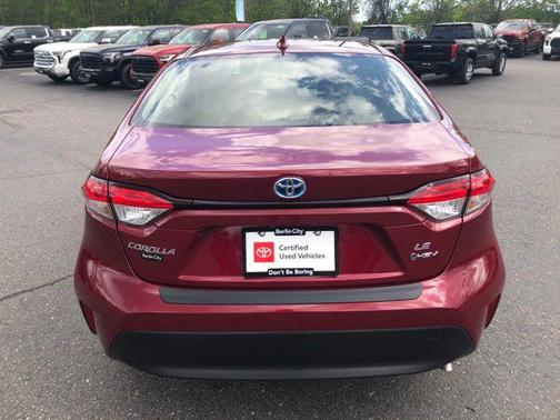 Ruby Flare Pearl 2025 Toyota Corolla Hybrid LE