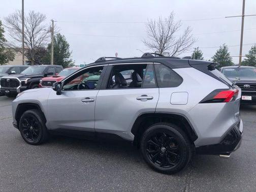 Silver Sky Metallic/Midnight Black Metallic 2023 Toyota RAV4 Hybrid SE