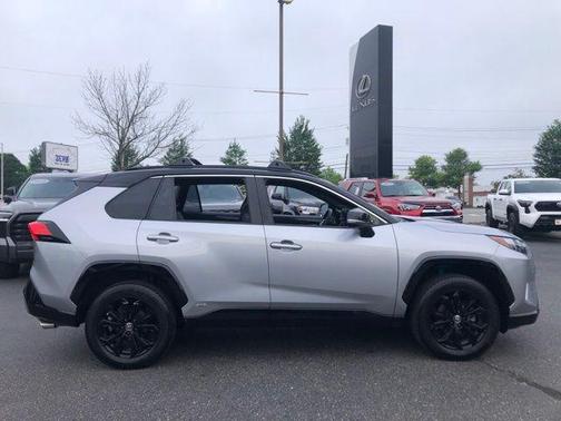 Silver Sky Metallic/Midnight Black Metallic 2023 Toyota RAV4 Hybrid SE