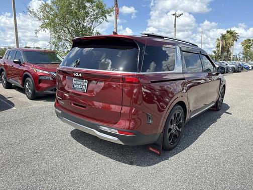 Red 2024 Kia Carnival SX Prestige