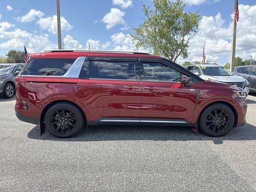 Red 2024 Kia Carnival SX Prestige