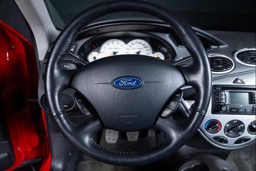 Red 2004 Ford Focus ZX3