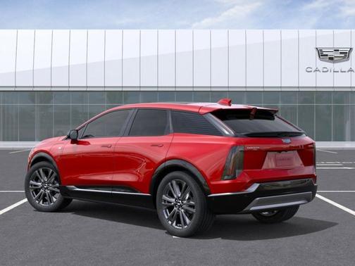 Radiant Red Tintcoat 2026 Cadillac OPTIQ Premium Sport