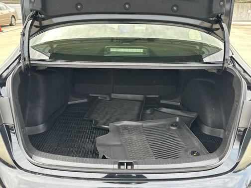 Midnight Black Metallic 2025 Toyota Corolla Hybrid LE