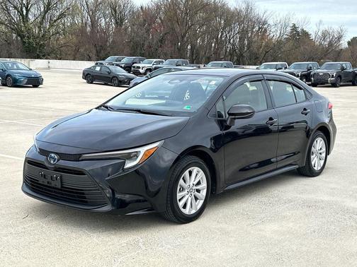 Midnight Black Metallic 2025 Toyota Corolla Hybrid LE