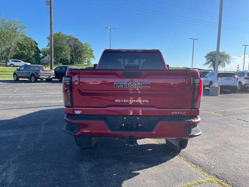 Volcanic Red Tintcoat 2026 GMC Sierra 2500 AT4