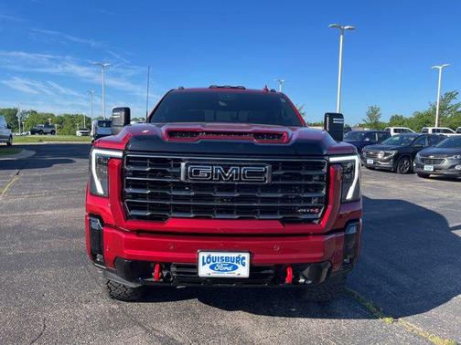 Volcanic Red Tintcoat 2026 GMC Sierra 2500 AT4
