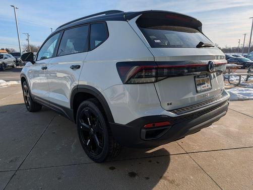 White 2026 Volkswagen Taos SE Black