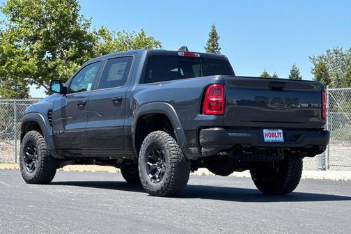 Forged Blue Metallic 2026 RAM 1500 RHO Crew Cab 4x4 5'7' Box