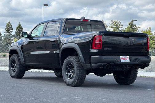 Diamond Black Crystal Pearlcoat 2026 RAM 1500 RHO Crew Cab 4x4 5'7' Box