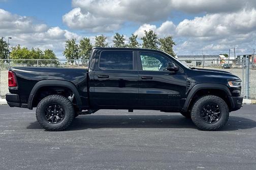 Diamond Black Crystal Pearlcoat 2026 RAM 1500 RHO Crew Cab 4x4 5'7' Box
