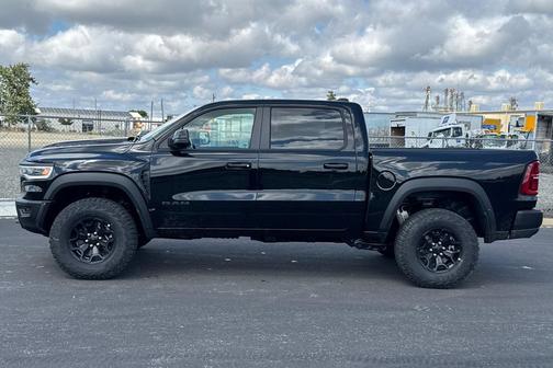Diamond Black Crystal Pearlcoat 2026 RAM 1500 RHO Crew Cab 4x4 5'7' Box
