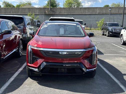 Radiant Red Tintcoat 2025 Cadillac OPTIQ Luxury 1 AWD