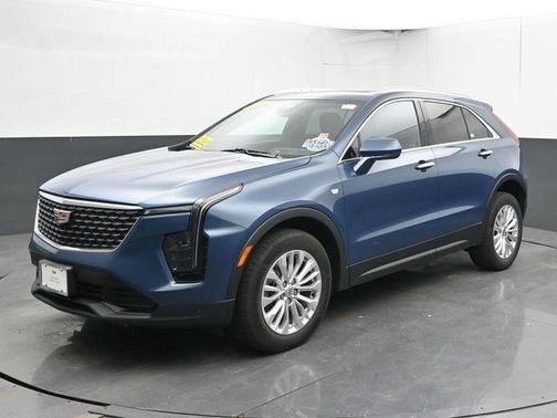 Deep Sea Metallic 2024 Cadillac XT4 Luxury