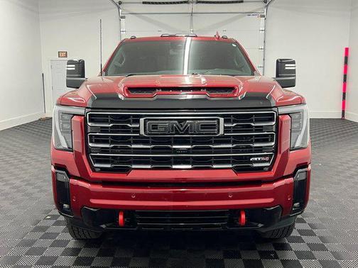 Volcanic Red Tintcoat 2025 GMC Sierra 3500 AT4