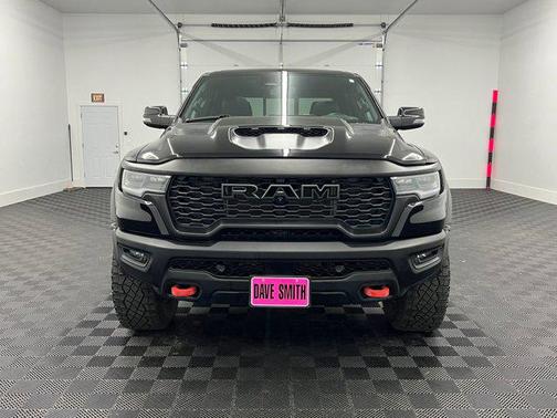 Diamond Black Crystal Pearlcoat 2025 RAM 1500 RHO Crew Cab 4x4 5'7' Box