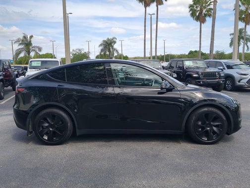 Solid Black 2024 Tesla Model Y Long Range Dual Motor All-Wheel Drive