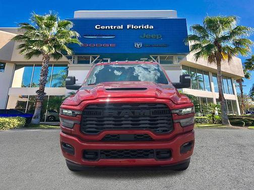 Molten Red 2026 RAM 2500 Black Express Crew Cab 4x4 6'4' Box