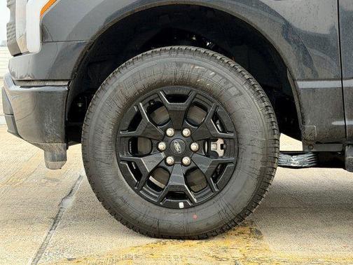 Agate Black Metallic 2025 Ford F-150 Lightning XLT