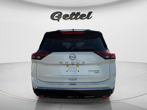 Everest White Pearl/Super Black 2026 Nissan Rogue Platinum