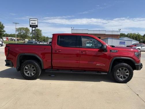 Volcanic Red 2024 GMC Sierra 1500 AT4X