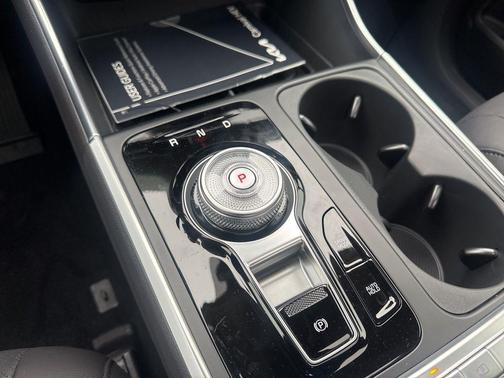 Ivory Silver 2026 Kia Carnival Hybrid SX Prestige