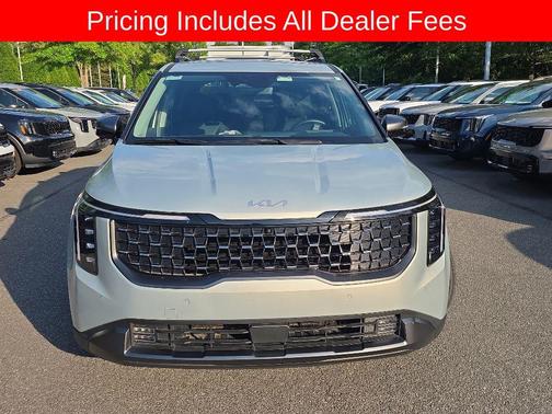 Ivory Silver 2025 Kia Carnival SX Prestige