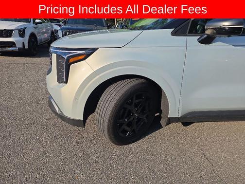 Ivory Silver 2025 Kia Carnival SX Prestige