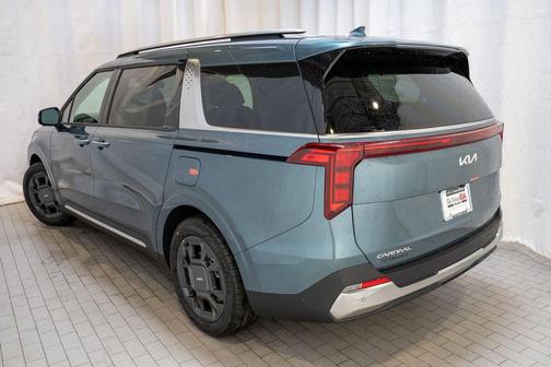 Astra Blue 2026 Kia Carnival SX