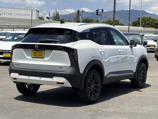 White 2026 Nissan Kicks SR