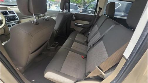 Light Sandstone Metallic Clearcoat 2010 Dodge Nitro SXT