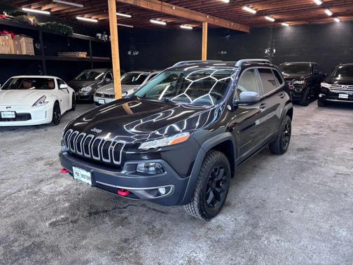Brilliant Black Crystal Pearlcoat 2015 Jeep Cherokee Sport