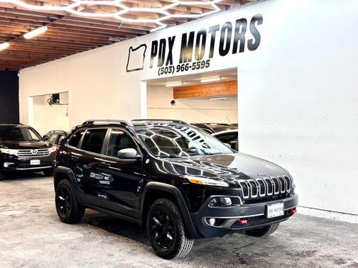 Brilliant Black Crystal Pearlcoat 2015 Jeep Cherokee Sport