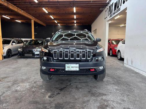 Brilliant Black Crystal Pearlcoat 2015 Jeep Cherokee Sport