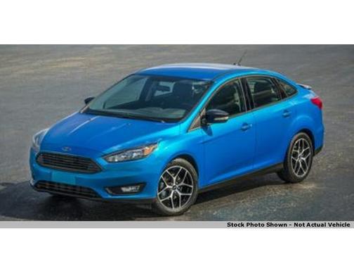 Red 2015 Ford Focus SE