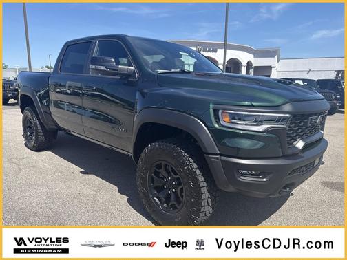 Serrano Green Metallic 2026 RAM 1500 RHO Crew Cab 4x4 5'7' Box