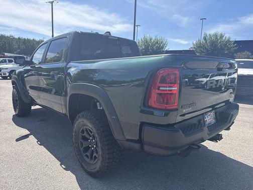 Serrano Green Metallic 2026 RAM 1500 RHO Crew Cab 4x4 5'7' Box