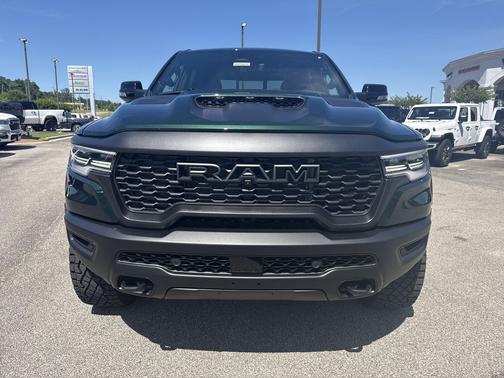 Serrano Green Metallic 2026 RAM 1500 RHO Crew Cab 4x4 5'7' Box