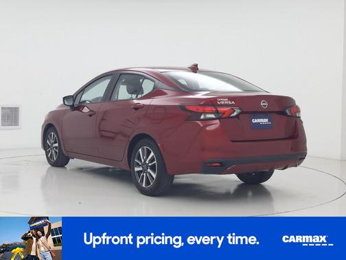 Red 2025 Nissan Versa SV