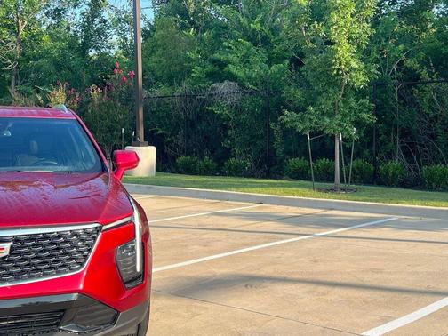 Radiant Red Tintcoat 2024 Cadillac XT4 Premium Luxury