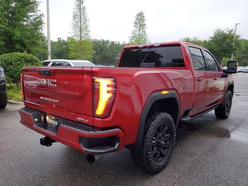 Volcanic Red Tintcoat 2025 GMC Sierra 2500 AT4