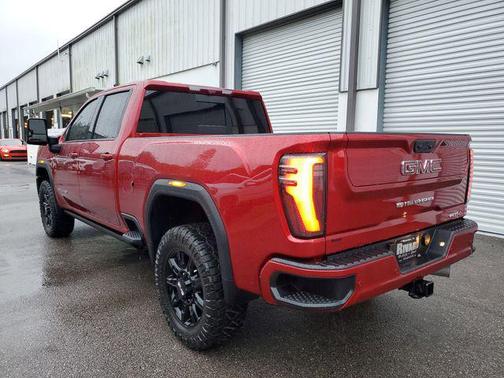 Volcanic Red Tintcoat 2025 GMC Sierra 2500 AT4