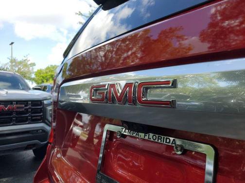 Volcanic Red Tintcoat 2024 GMC Yukon XL Denali