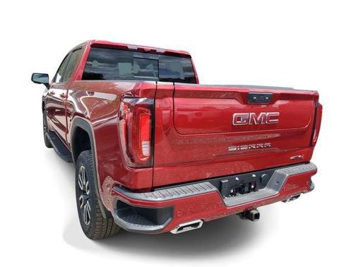 Volcanic Red Tintcoat 2026 GMC Sierra 1500 AT4
